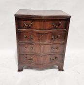 Reproduction mahogany serpentine-fronted chest of four long drawers, 75 x 61 x 44 cms a George II-