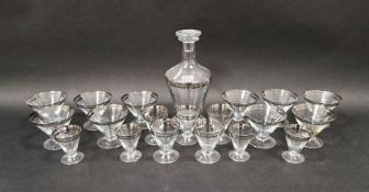 1930's Art Deco glass decanter with silver band and matching drinking glasses of various sizes