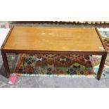 1960's teak coffee table of rectangular form with rounded supports, 37cm high x 97cm wide x 48cm
