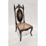 Ebonised papier mache and mother-of-pearl cane chair, a mini salon settee and two upholstered chairs