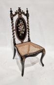 Ebonised papier mache and mother-of-pearl cane chair, a mini salon settee and two upholstered chairs
