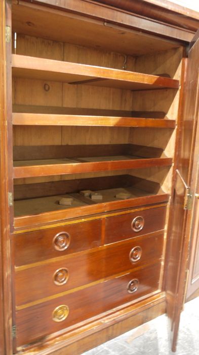 Victorian mahogany compactum with moulded cornice above three doors centred by a mirror, flanked - Image 2 of 3