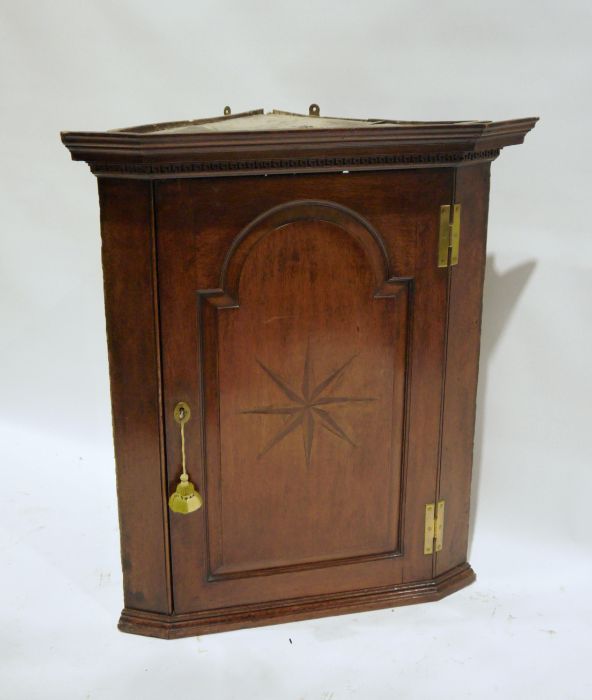 19th century mahogany star inlaid corner cupboard,  106 cms h. x 90cm wide x 52 cms