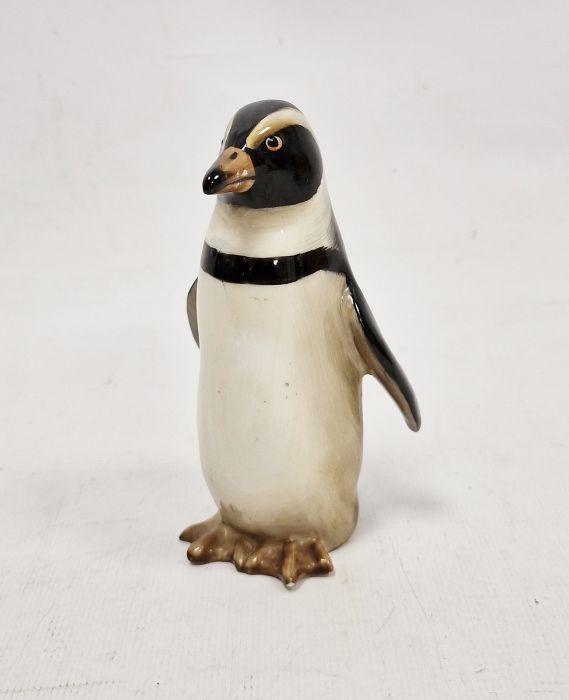 Royal Doulton model of a penguin, printed green marks, black HN. 134 impressed and incised numerals,
