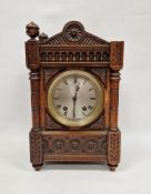 19th century German oak cased mantel clock in intricately carved case with acorn finials (two