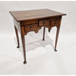 George III oak lowboy with shaped apron, on turned tapering supports, pointed pad feet , bears Druce