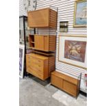 Swedish string wall hanging shelving unit comprising of cupboards and chest of four drawers