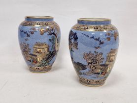 Pair of Adderley & Co. Art Deco Mandarin pattern pewter blue ground oviform vases, printed blue