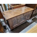 18th century carved oak coffer with carved panel front, on straight supports, 65 cms h. x 119cm wide