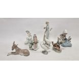 Six Lladro figures, printed blue marks, impressed numerals comprising two birds perched on flowering
