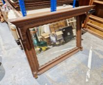Carved oak overmantel mirror with bevelled edge