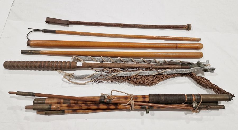 Ogden Smiths 'reversa' landing net with turned wood handle together with a vintage cane fishing