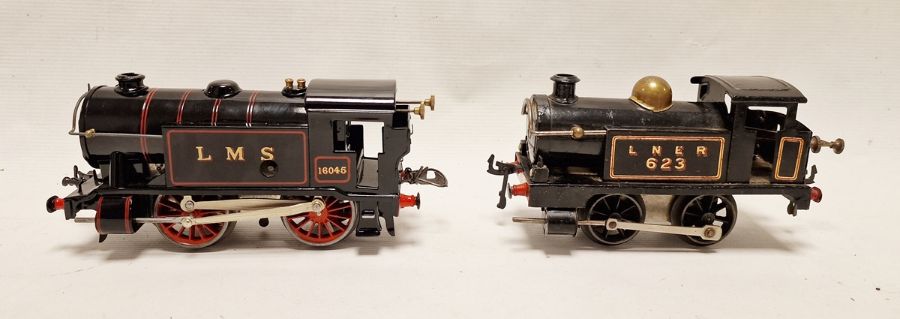 Hornby '0' gauge clockwork 0-4-0 tank black locomotive marked LMS no16045 in gilt together with a