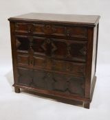 17th century oak chest of four graduating long drawers, with geometric moulding, pendant brass