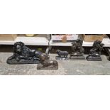 Collection of hollow back cast iron doorstops, four in the form of lions, two rampant and two