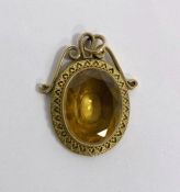 Gold (unmarked) oval pendant set with oval citrine-coloured stone, 3cm approx., 6.5g total approx.