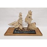 Model of the training brig 'Martin' by T.M. Devitt, with lifeboat, small figures of sailors, in