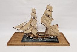Model of the training brig 'Martin' by T.M. Devitt, with lifeboat, small figures of sailors, in