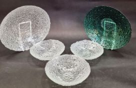 Five Pavel Panek (1945-2008) droplet bowls, three clear and one green glass, two larger and three