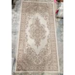 Eastern style cream ground wool pile rug with central floral medallion, multiple herati and floral