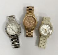 Three Michael Kors wristwatches