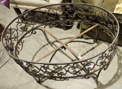 Wrought iron plant stand (lacking interior), 92cm x 61cm