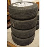 Four BMW alloy wheels (255/55 R18) with Continental winter contact tyres for BMW X5