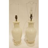 Pair of cream ceramic table lamps, 39cm high
