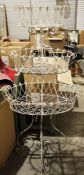 Early 20th century wire plant stand, with three tiered baskets on four supports, 150cm high x 78cm