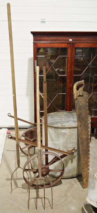 Galvanised metal large water carrier with wheels, 65cm high, a vintage pitch fork, a vintage fork