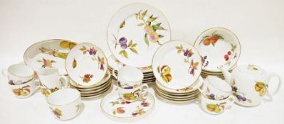 Royal Worcester 'Evesham' part service to include seven dinner plates, six bowls, a flan dish, six
