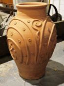 Terracotta garden urn with moulded decoration, 59cm