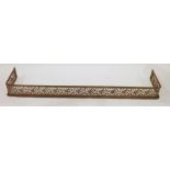 Copper fire curb, 15cm x 36cm and a cast iron fire curb with pierced floral decoration, 50cm x