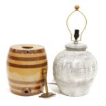 Large earthenware beer cask and a large circular pottery lamp (2)