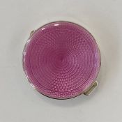 1920's circular silver and pink enamel compact with mirror to inside of lid, Birmingham 1928,