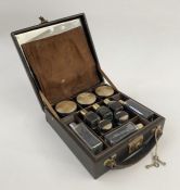 1930's Asprey silver and gold enamel travelling toiletry set, Birmingham 1935, makers mark AJG, in