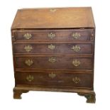 Georgian mahogany bureau, the fall front enclosing fitted interior with central cupboard,