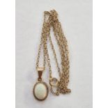 Gold and opal pendant, the oval stone with rope border, on fine 9ct gold chain