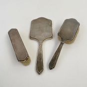 Victorian silver three-piece dressing set, engine turned including silver-backed mirror and two