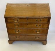 George III mahogany bureau, the fall front enclosing fitted interior with pigeonholes, drawers and