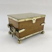 Plated and oak tea caddy, the plate lid engraved, with plate fittings, on round pad feet and