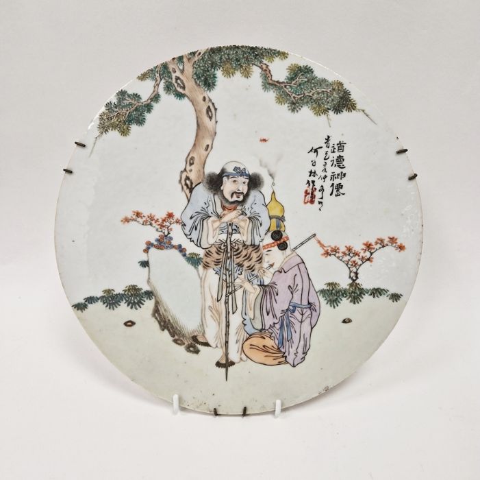 Chinese porcelain plaque, circular and painted with old man leaning on a gnarled peach stick with - Image 3 of 4