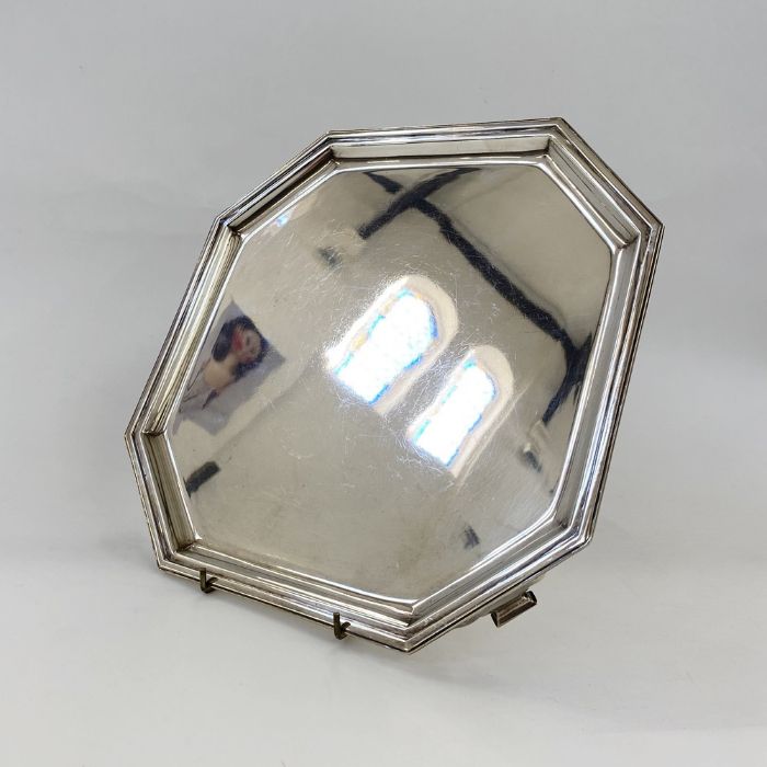 Silver salver, Goldsmiths, square with cut-off corners with scroll and stepped tab feet, modern,