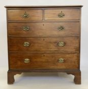 Late Georgian mahogany chest of two short and three long graduated drawers, with brass drop handles,