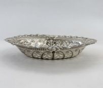 Silver trinket dish, oval and pierced with flowerhead border and scroll decoration, Chester 1901,