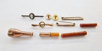 9ct gold cheroot holder in fitted case, a 10ct gold dress stud, a 9ct gold dress stud and a 9ct gold