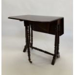 Mahogany Sutherland table, rectangular with cut-off corners, on ring turned supports, opening to