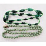 Jade bead necklace with gold-coloured metal clasp and safety chain and string of graduated oval