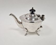 Silver teapot raised on four tab feet, with blackwood finial (handle lacking), 9ozt approx.