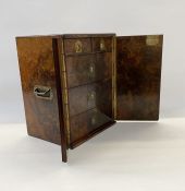 A Victorian burr walnut humidor /cigar cabinet, rebated brass handles to the sides, Bramah lock